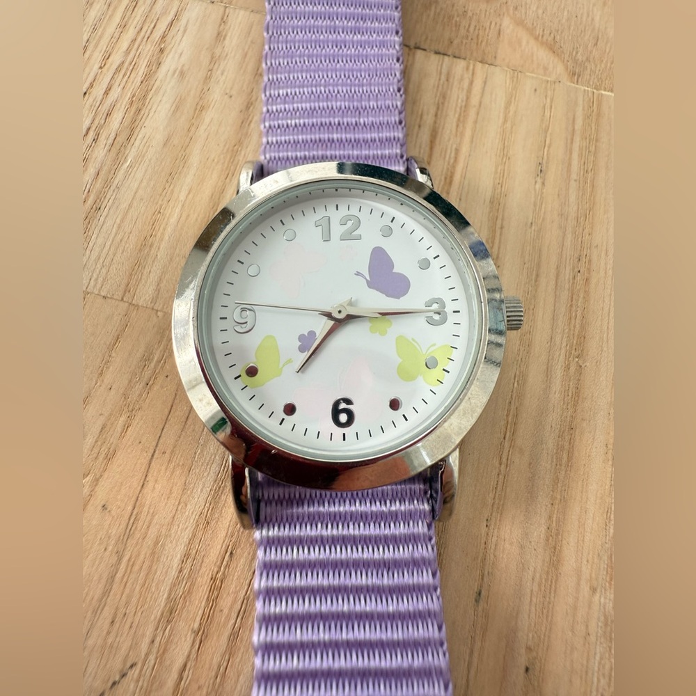 Unbranded ladies silver tone purple butterfly fashion watch NEW BATTERY